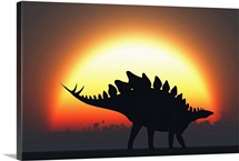 A Stegosaurus silhouetted against the setting Sun at the end of a prehistoric day