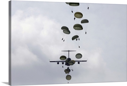 Army Soldiers jump out of a C17 Globemaster III
