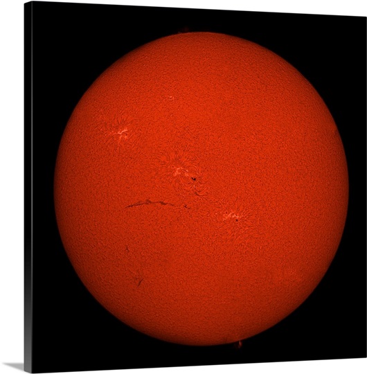 H alpha full Sun in red color with active areas and filaments