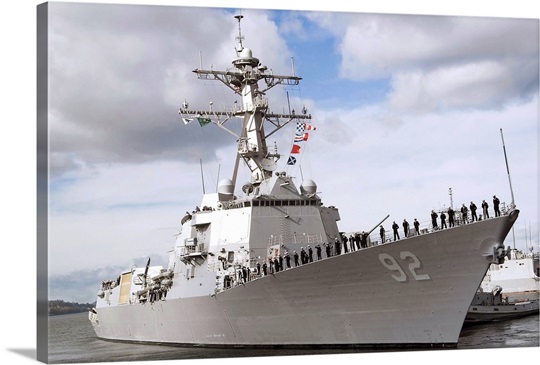 Sailors man the rails aboard the guidedmissile destroyer USS Momsen