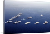Ships and Rigid Hull Inflatable Boats assemble in formation