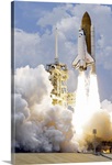 Space Shuttle Atlantis lifts off from its launch pad