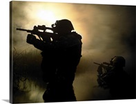 Special operation forces combat divers armed with Steyr AUG assault rifles