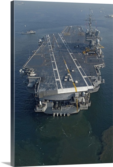 The conventionally powered aircraft carrier USS Kitty Hawk
