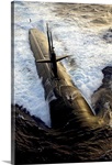 The Los Angelesclass submarine USS Albuquerque surfaces in the Atlantic Ocean