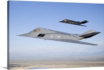 Two F-117 Nighthawk stealth fighters in flight over New Mexico