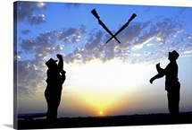 Two Staff Sergeants perform Overs maneuver while practicing drill for Base Honor Guard