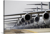 US Air Force C17 Globemaster IIIs lined up on the runway awaiting takeoff