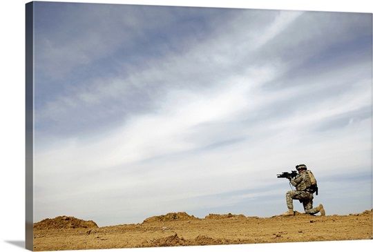 US Army Sergeant provides security during a patrol in Iraq