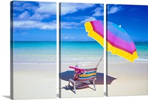 Beach Chair And Umbrella With Snorkel Gear, Turquoise Ocean And Blue Skies
