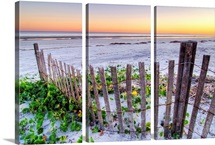 A beach fence at sunset on Hilton Head Island, South Carolina.
