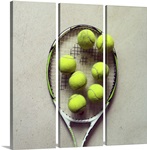 Tennis racquet and tennis balls.