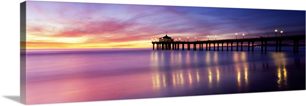 Reflection of a pier in water, Manhattan Beach Pier, Manhattan Beach, San Francisco, California