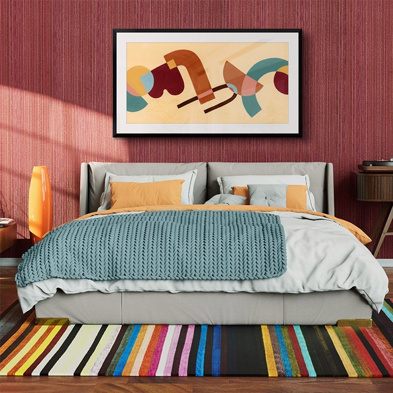 Framed print of mid-century abstract flowers in a dining room