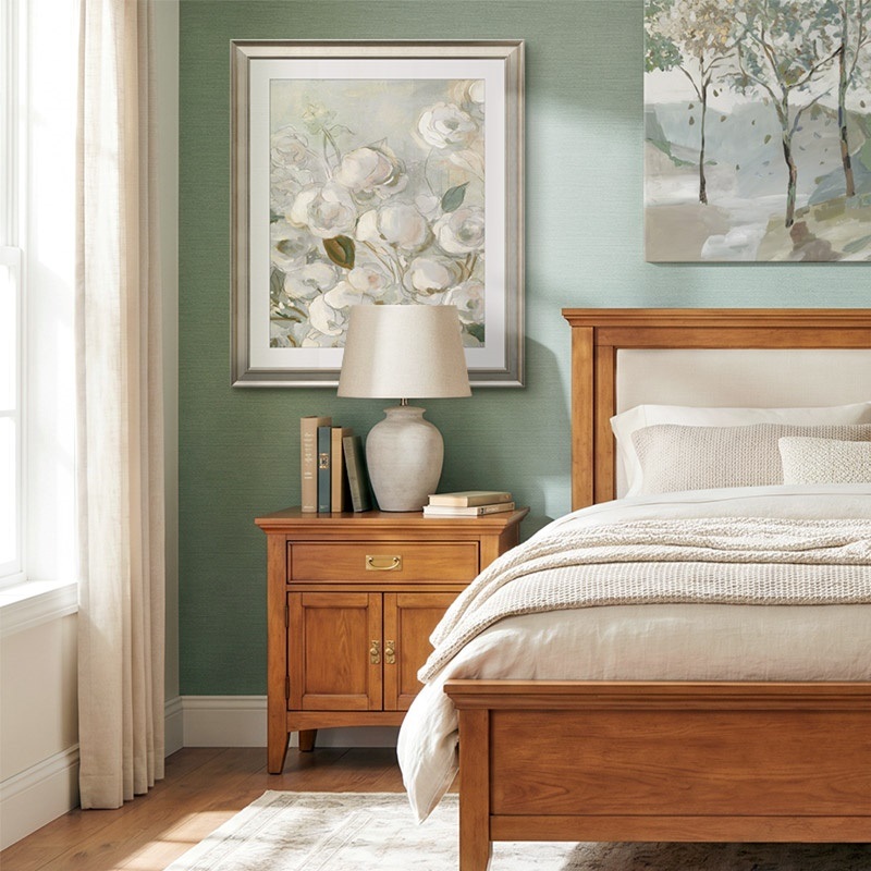 framed print of contemporary florals in a traditional bedroom