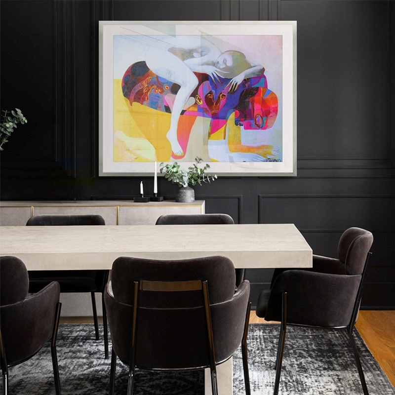 framed print of a contemporary abstract painting of people in a bold dining room