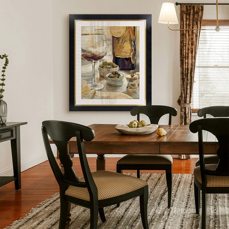 framed print of a contemporary painting of wine in a traditional dining room