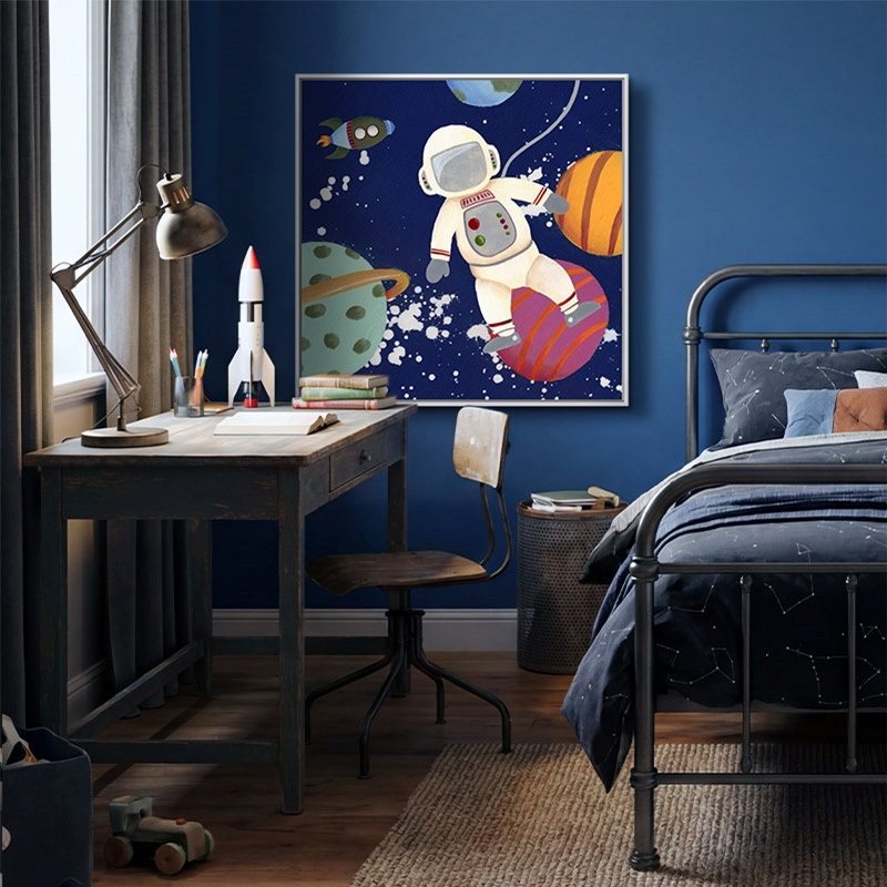 Floating framed canvas print of an astronaut in a boy's bedroom