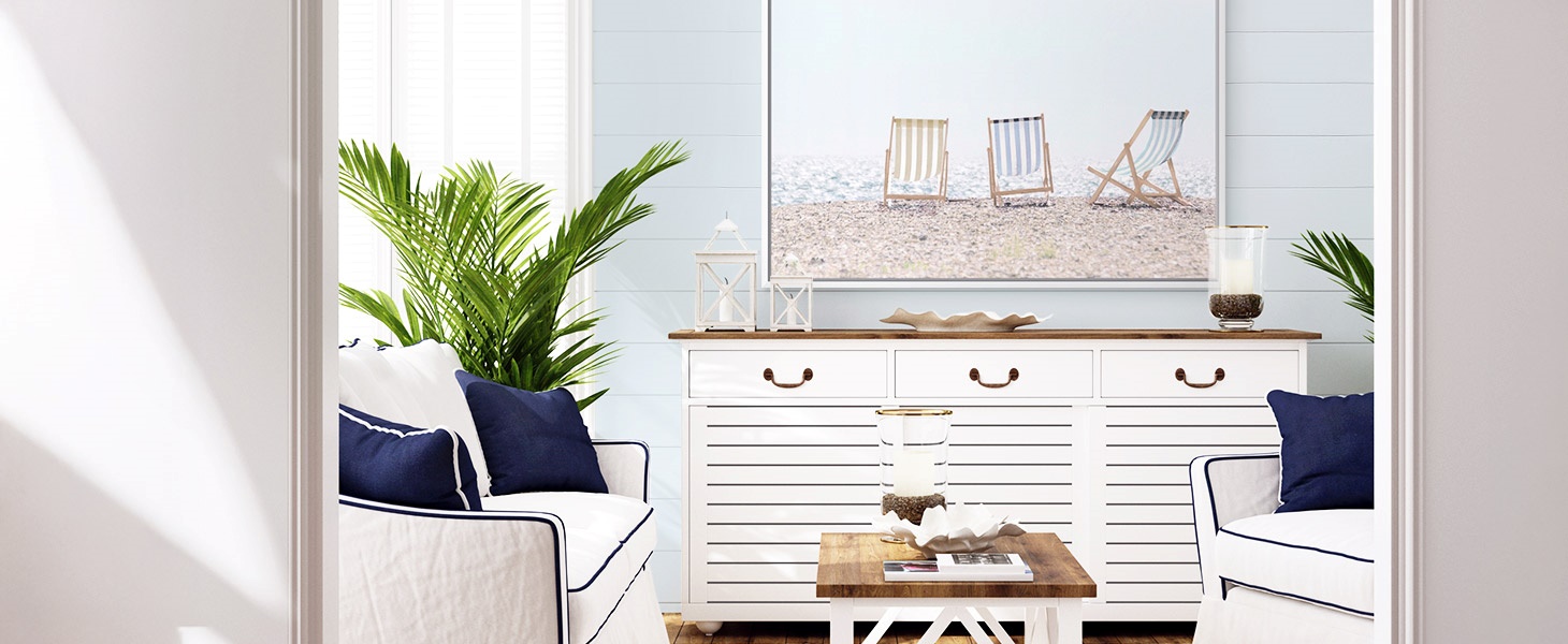 floating framed canvas of a photograph of beach chairs in a coastal living room