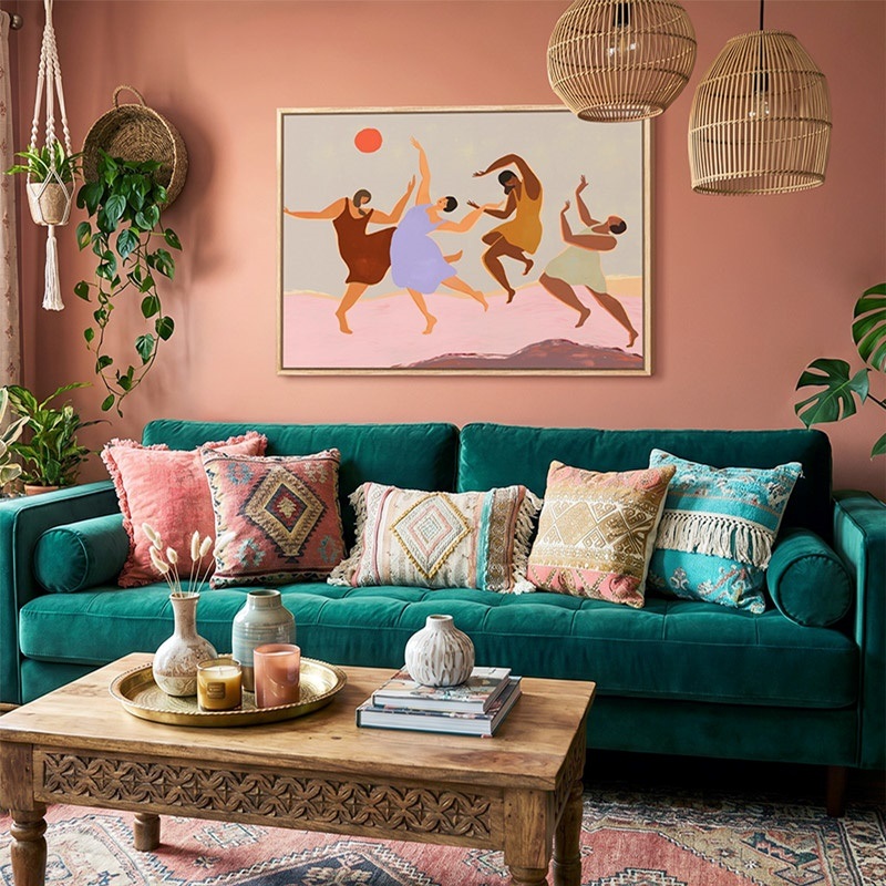 natural floating framed canvas print of bohemian art of women dancing hanging in a living room