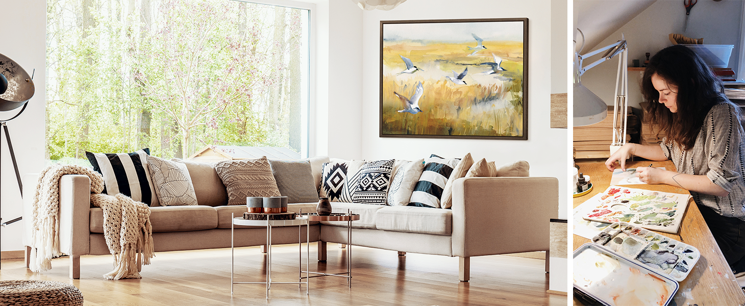 Framed print of a coastal painting in a Mediterranean bathroom
