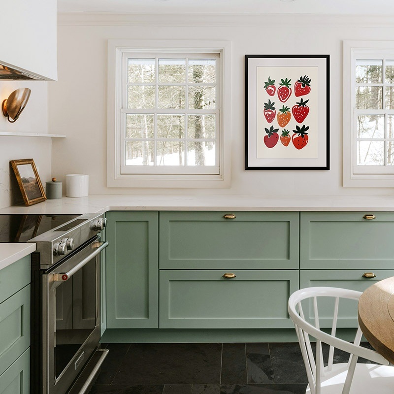 framed print of strawberry art in a modern kitchen
