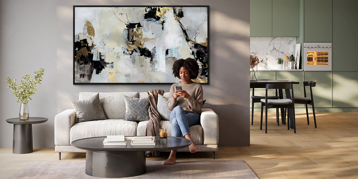 framed canvas print of a painting of flowers in a modern dining room