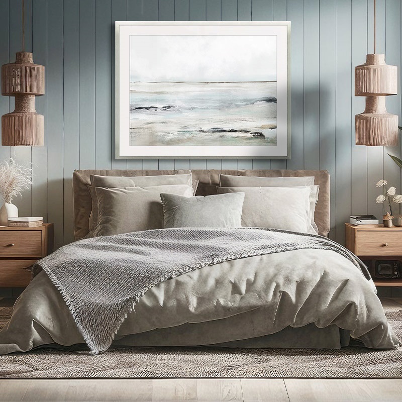 Framed print of soft coastal painting in a Mediterranean bedroom