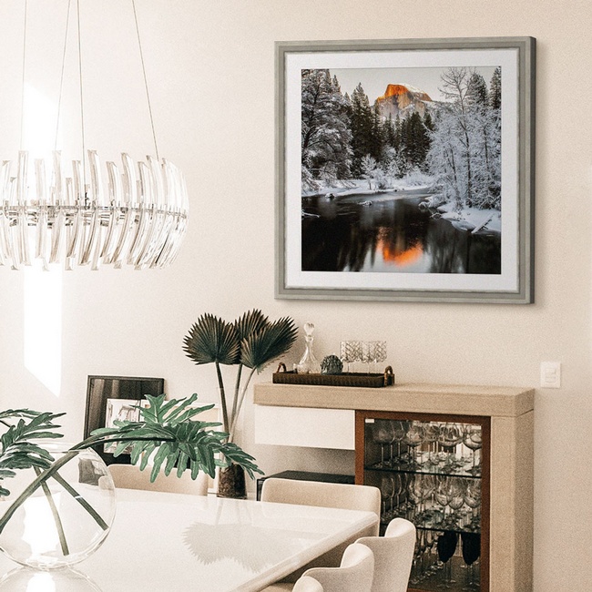 Glam Dining Room with a Framed Winter Landscape