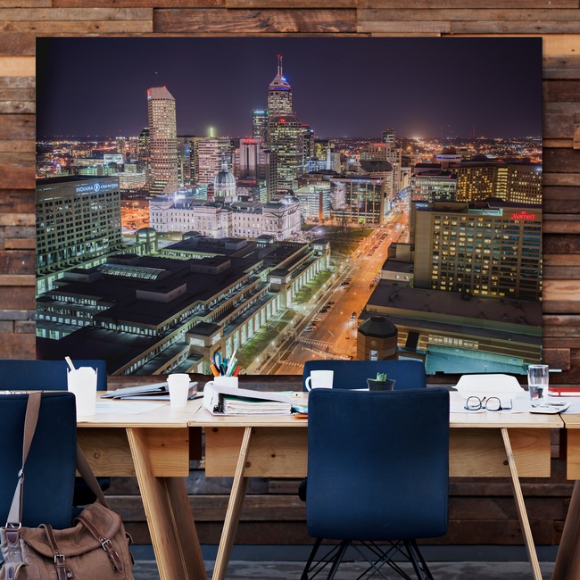 Nighttime City Skyline Art in a Modern Co-working Space