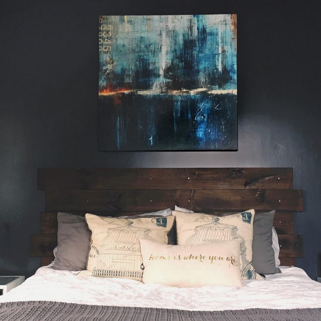Moody Rustic Bedroom with Abstract Art