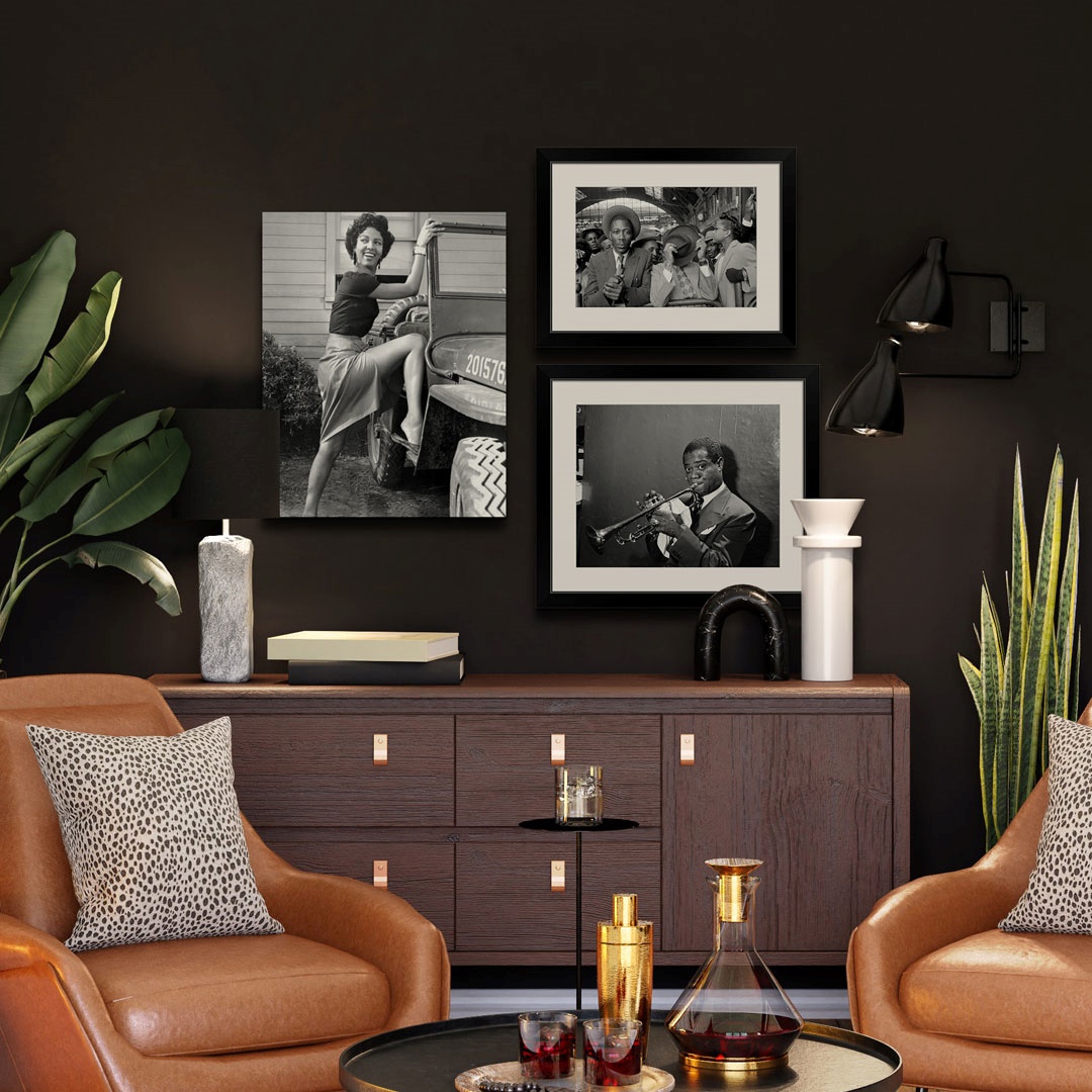 one canvas print & two framed prints of famous black history photos in black and white above a couch
