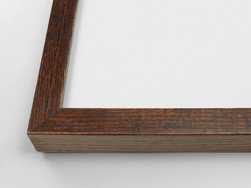 Close-up view of the corner of an art print with a frame