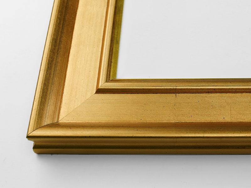 Close-up view of the corner of an art print with a frame