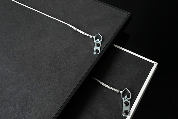 hanging hardware that is included with each framed print