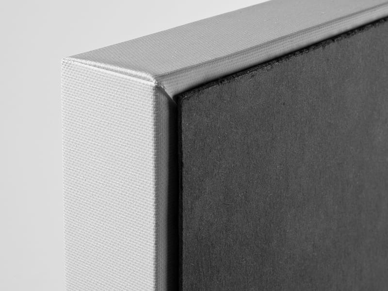 Close-up view of a solid-faced canvas corner from the back