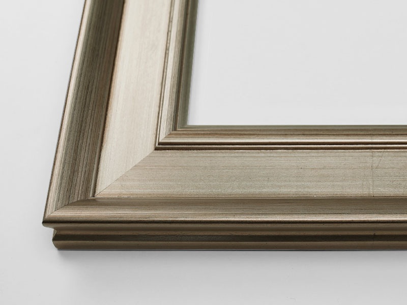 Close-up view of the corner of an art print with a frame