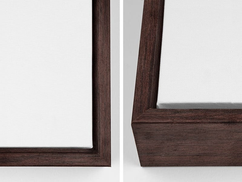 Close-up views of the corners of a canvas with a walnut floating frame