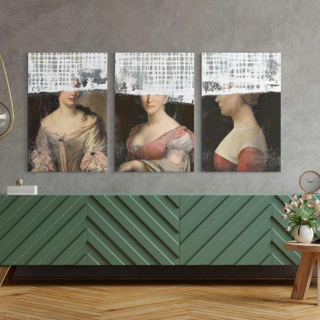 three classic female portraits with a modern twist hung in a modern entryway