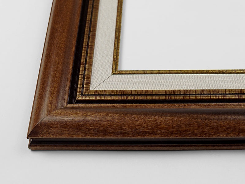 Close-up view of the corner of an art print with a frame