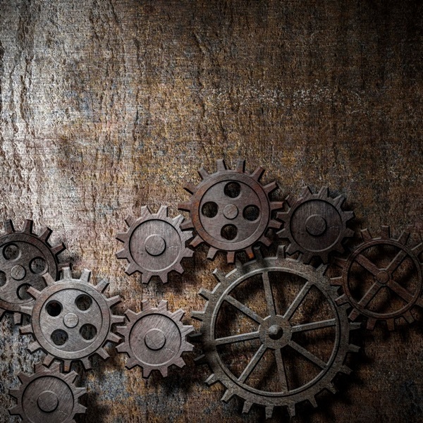 Rusty Gears And Cogs On A Metal Background