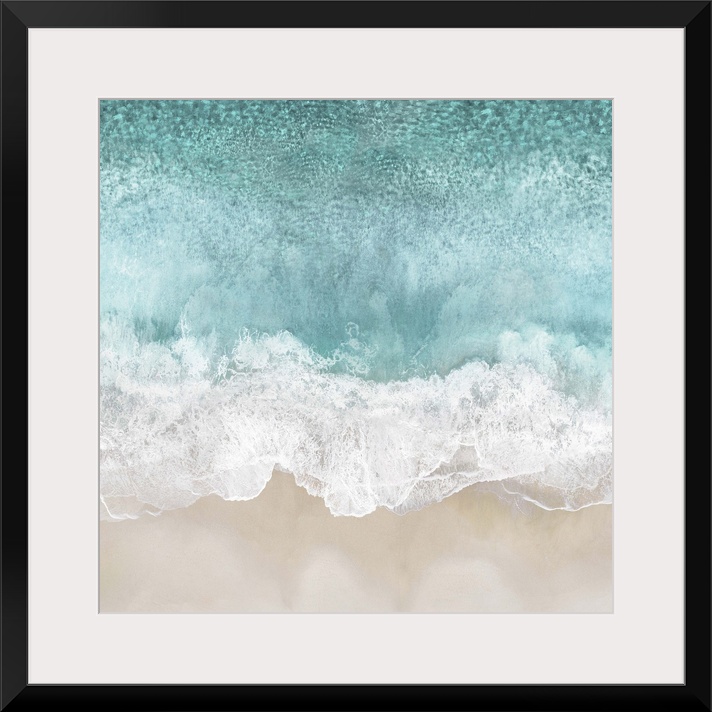 One artwork in a series of aerial shots of a beach as light blue waves break upon the shore.
