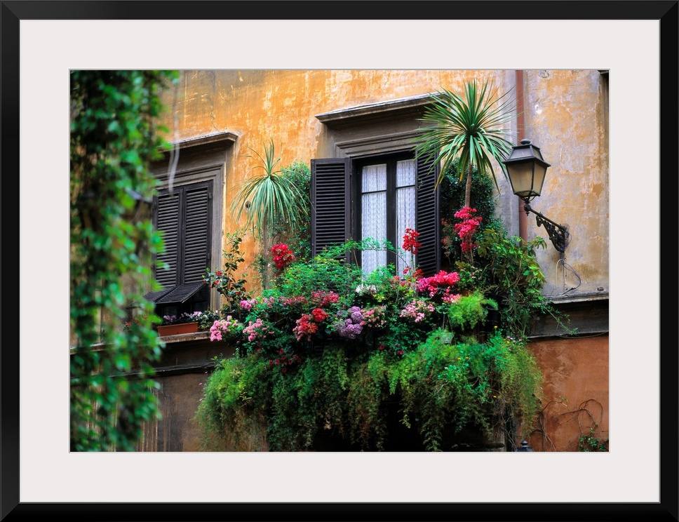 Italy, Rome, Historical Center, typical window with flowers