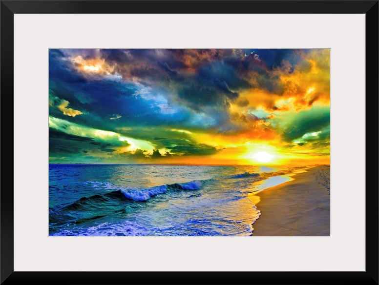 A beautiful sea at sunset in this landscape photo. A seascape with waves on the shore before a beautiful sunset with expan...