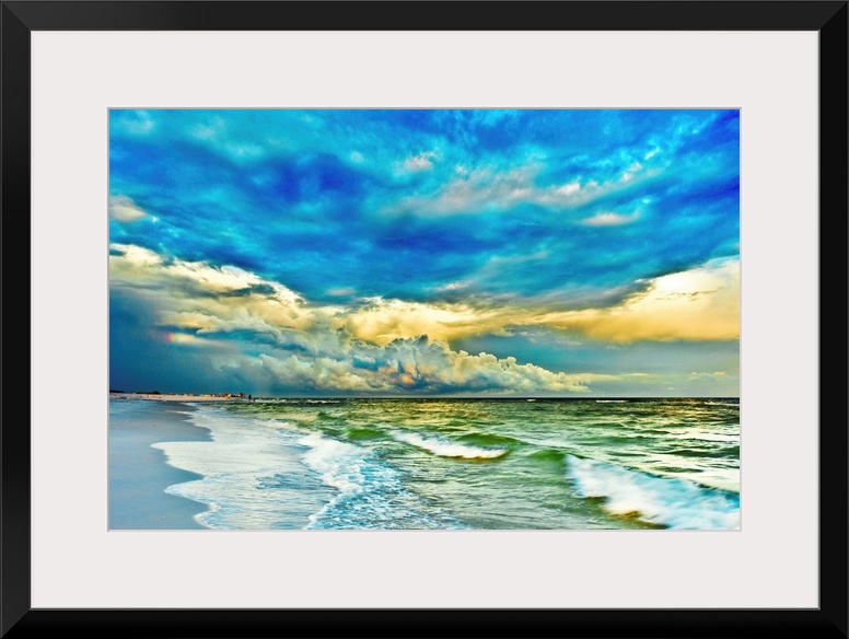A blue and turquoise sea with a painted looking sunset. This makes for a beautiful landscape photography print of a blue a...