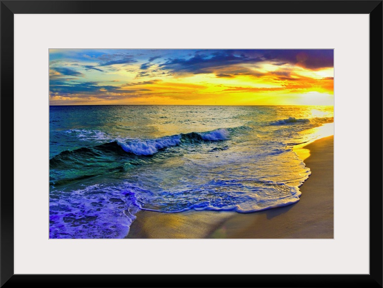 Image of waves rolling over Navarre beach before a dark yellow sunset seascape. Landscape taken on Navarre Beach, Florida.