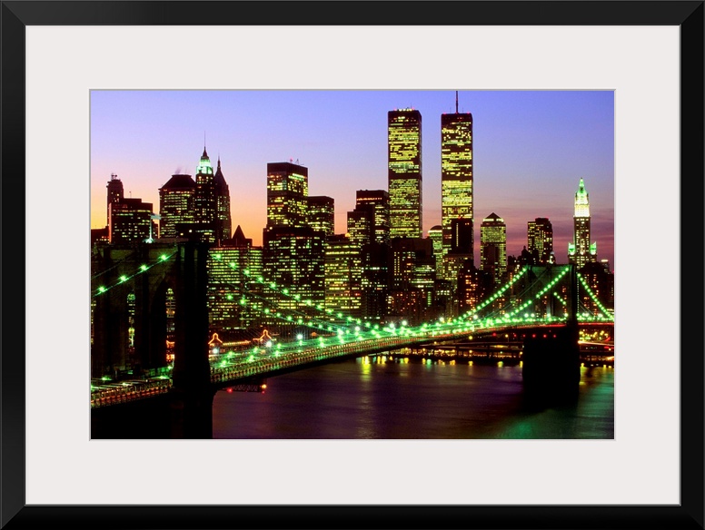 Brooklyn Bridge and Manhattan skyline at dusk, New York