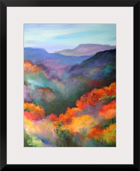 Tall canvas painting of brightly colored trees with mountains in the distance.