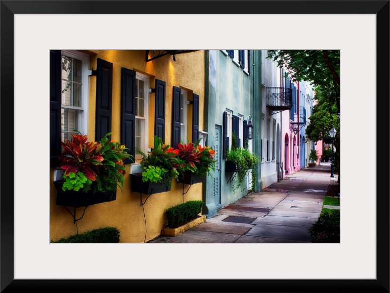 Fine art photo of a shaded alley with colorful buildings in Charles, South Carolina.