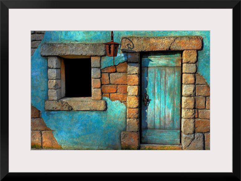 Landscape fine art photograph highlighting a door surrounded by a stone wall and window.